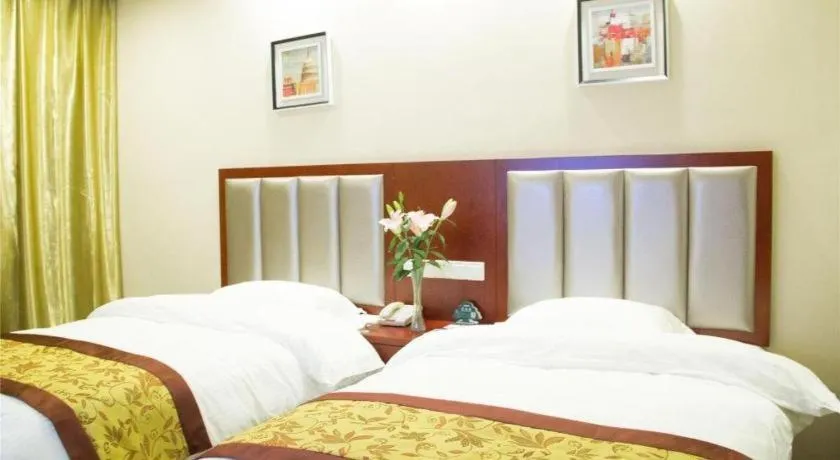 Bed in GreenTree Inn JiangSu Wuxi Jiangyin City QinGYAng Town Fuqian Road Express Hotel