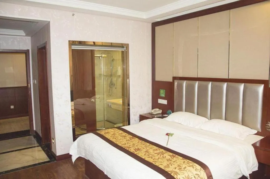 Bed in GreenTree Inn JiangSu Wuxi Jiangyin City QinGYAng Town Fuqian Road Express Hotel