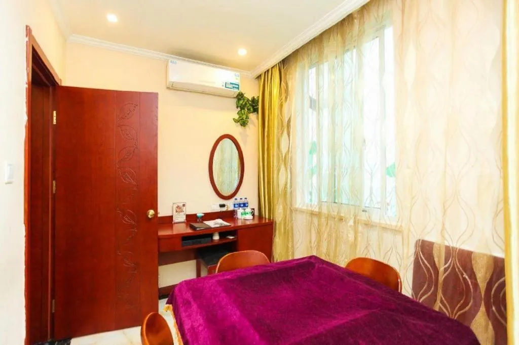 Bed in GreenTree Inn JiangSu Wuxi Jiangyin City QinGYAng Town Fuqian Road Express Hotel