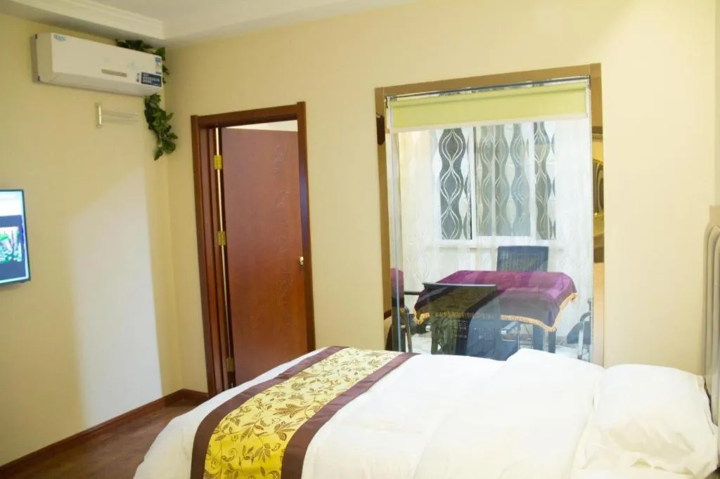 Bed in GreenTree Inn JiangSu Wuxi Jiangyin City QinGYAng Town Fuqian Road Express Hotel