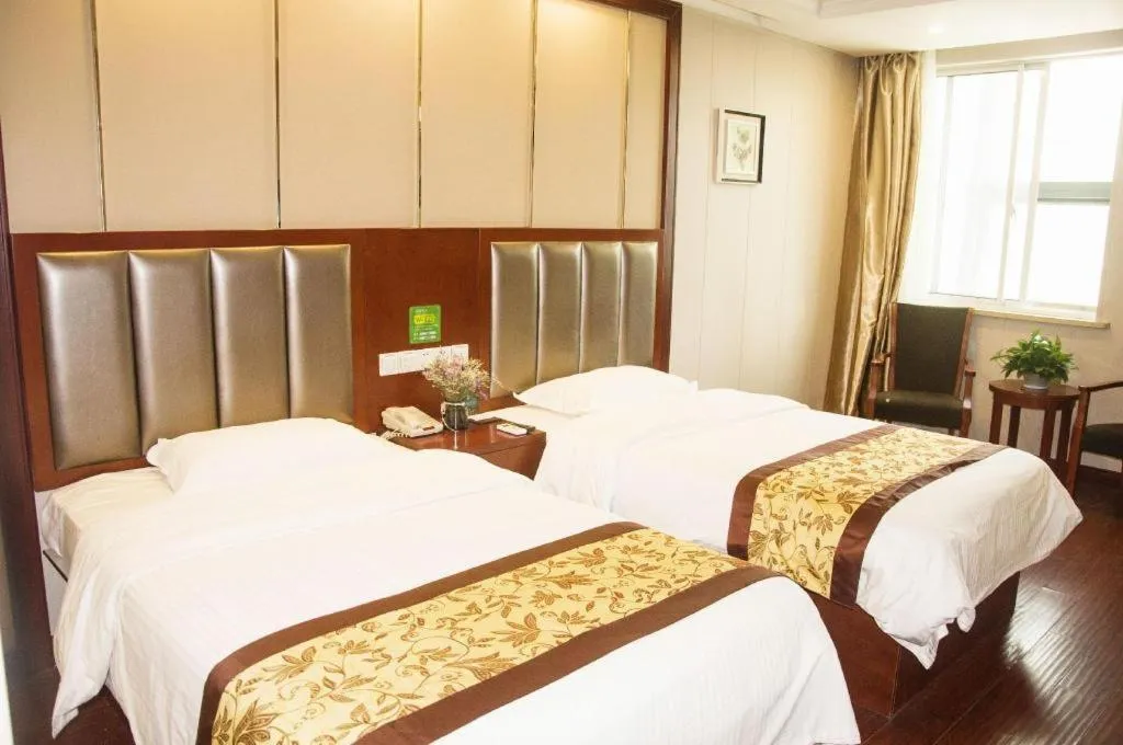 Bed in GreenTree Inn JiangSu Wuxi Jiangyin City QinGYAng Town Fuqian Road Express Hotel