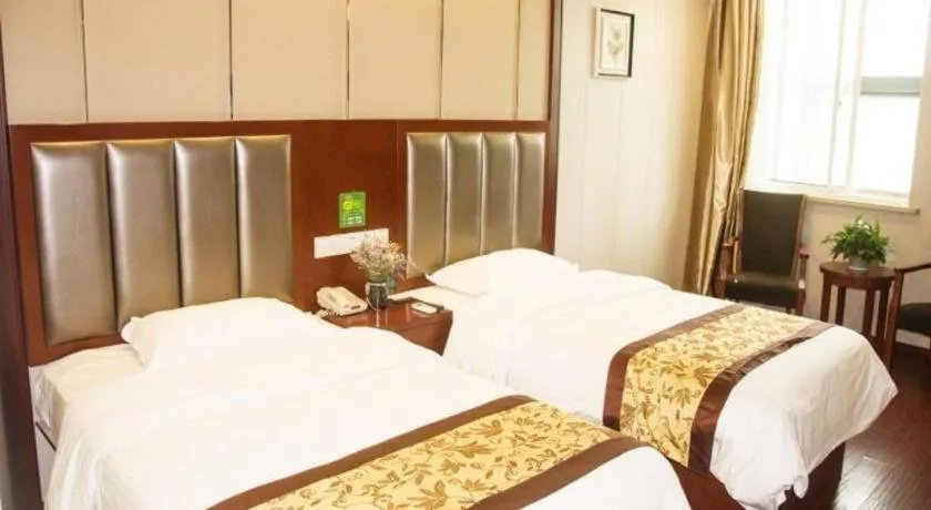 Bed in GreenTree Inn JiangSu Wuxi Jiangyin City QinGYAng Town Fuqian Road Express Hotel