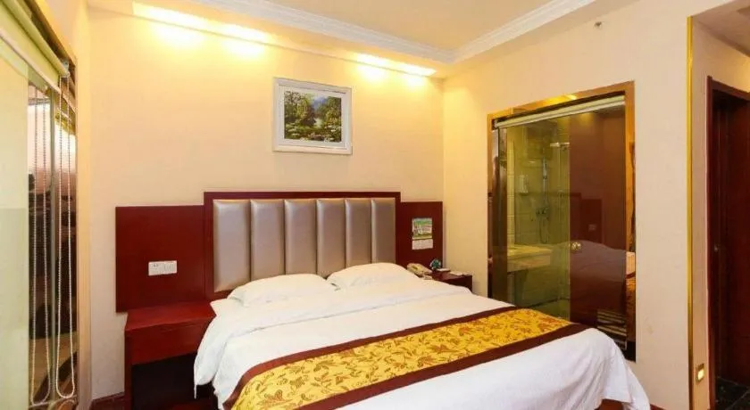 Bed in GreenTree Inn JiangSu Wuxi Jiangyin City QinGYAng Town Fuqian Road Express Hotel