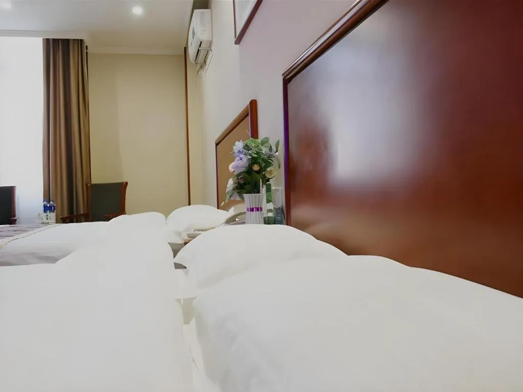 Bed in GreenTree Inn Hefei Feidong Guiwang Road Luzhou Medical School Business Hotel