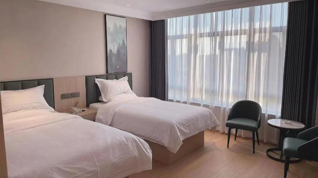 Bed in GreenTree Inn Chizhou Pingtian Lake Qingfeng Avenue Business Hotel