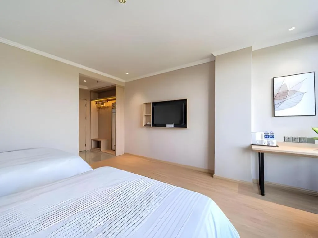 Bed in GreenTree Inn Chizhou Pingtian Lake Qingfeng Avenue Business Hotel