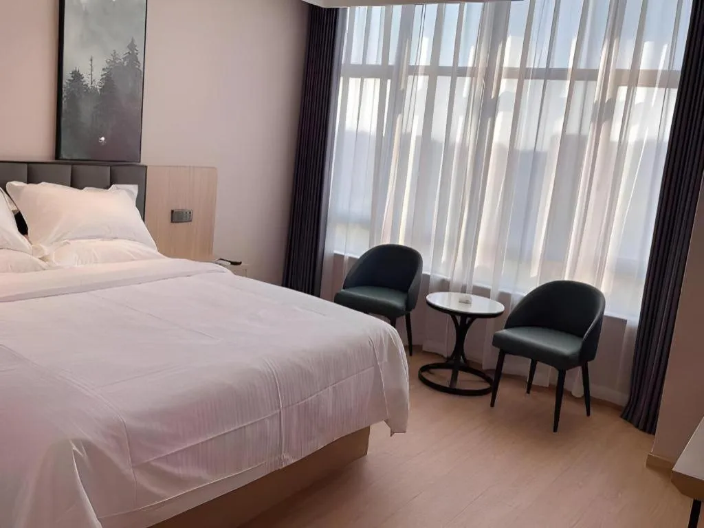 Bed in GreenTree Inn Chizhou Pingtian Lake Qingfeng Avenue Business Hotel
