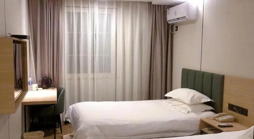 Bed in GreenTree Inn Yangzhou Slender West Lake Wencheng Attic Express Hotel