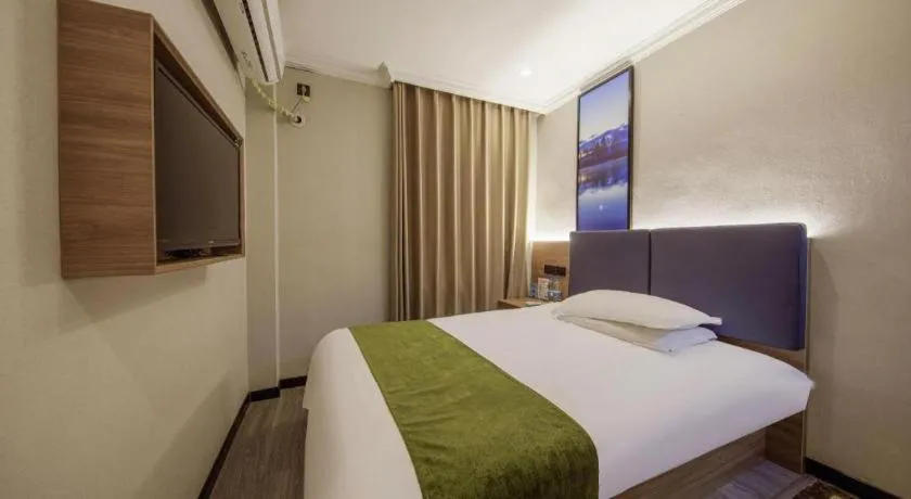Bed in GreenTree Inn Shanghai MinHang ZhuanQiao Subway Station East ZhuanXing Road Shell Hotel