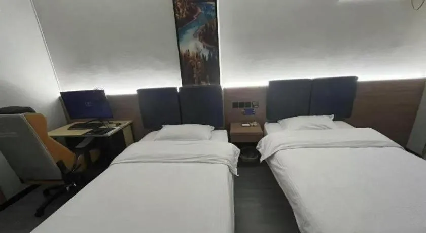 Bed in GreenTree Inn Shanghai MinHang ZhuanQiao Subway Station East ZhuanXing Road Shell Hotel