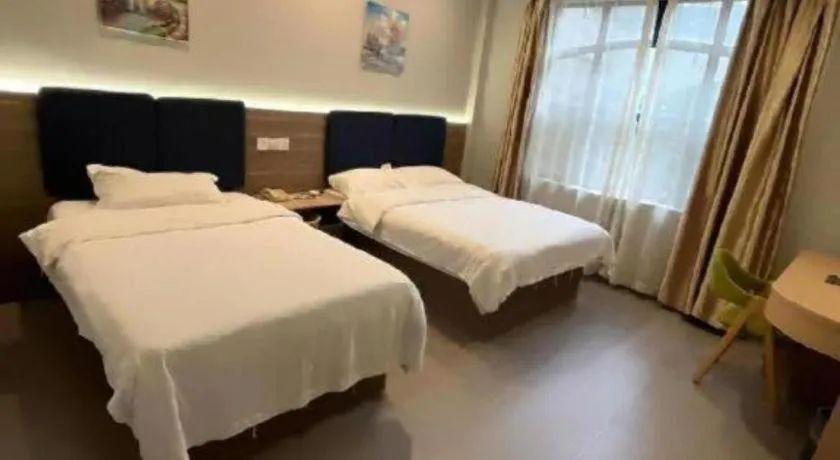 Bed in GreenTree Inn Shanghai MinHang ZhuanQiao Subway Station East ZhuanXing Road Shell Hotel