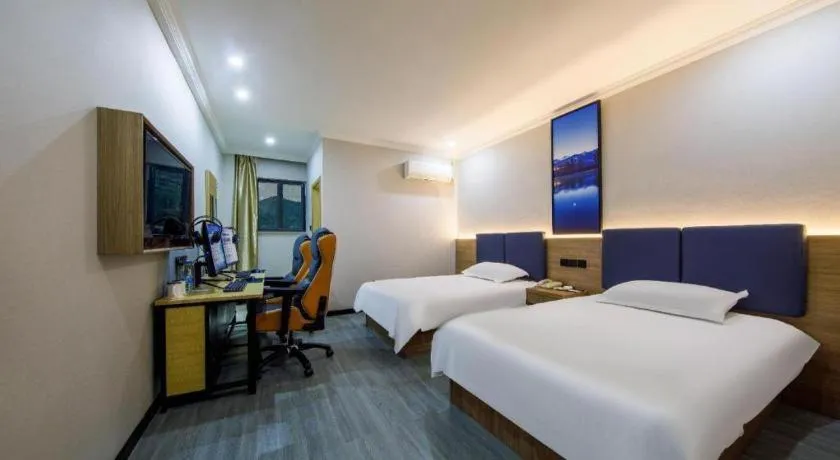 Bed in GreenTree Inn Shanghai MinHang ZhuanQiao Subway Station East ZhuanXing Road Shell Hotel