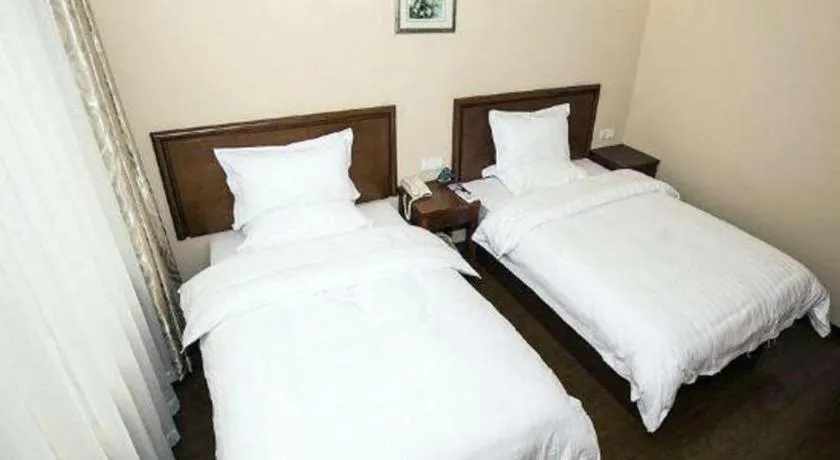 Bed in GreenTree Inn Shanghai Hongqiao Airport Huqingping Highway Shell Hotel