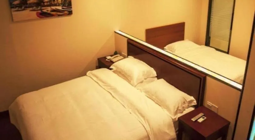 Bed in GreenTree Inn Wuhu Fangte Second Phase Nanxiang Wanshang Express Hotel