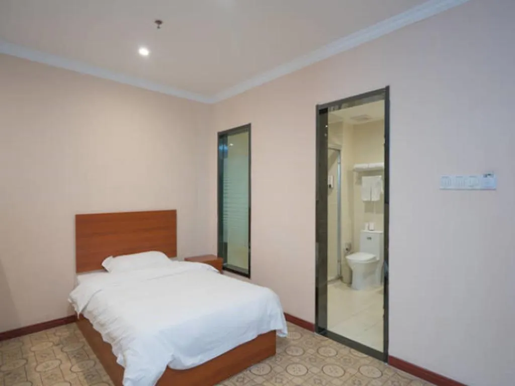 Bed in GreenTree Inn Wuhu Fangte Second Phase Nanxiang Wanshang Express Hotel