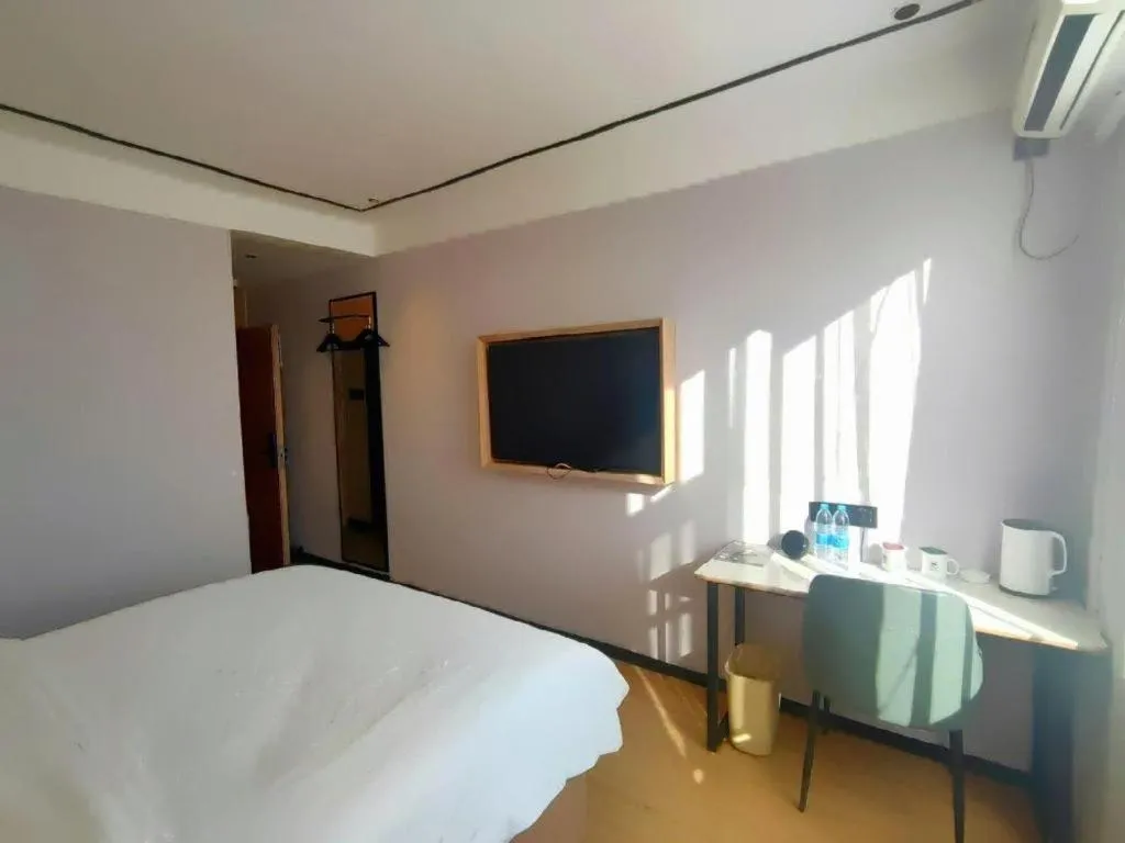 Bed in GreenTree Inn Langfang GuanGYAng District GuanGYAng Road City Government Express Hotel