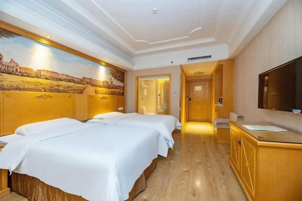 Bed in Vienna International Hotel Lhasa Potala Palace