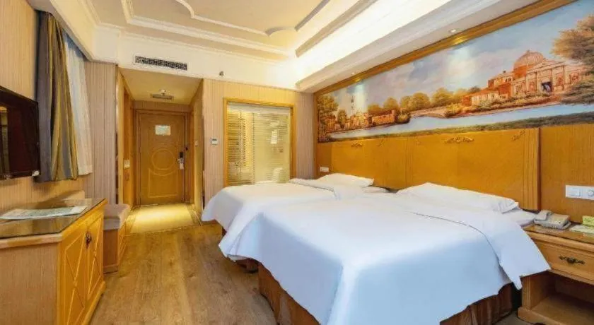 Bed in Vienna International Hotel Lhasa Potala Palace