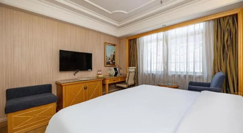 Bed in Vienna International Hotel Lhasa Potala Palace