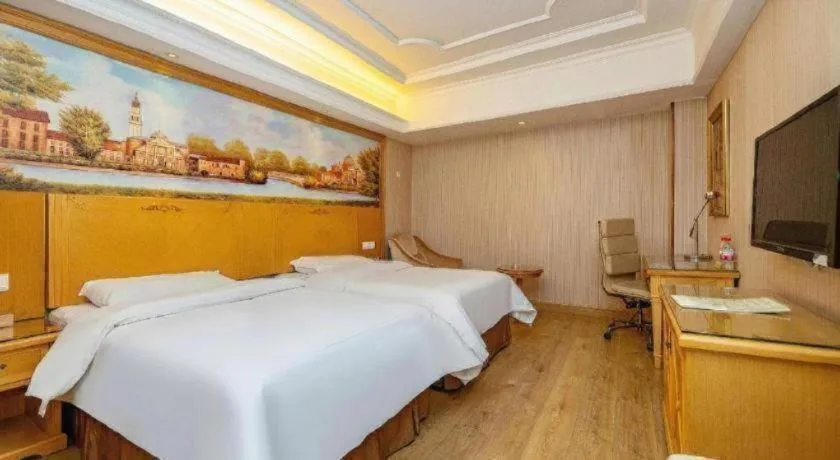 Bed in Vienna International Hotel Lhasa Potala Palace