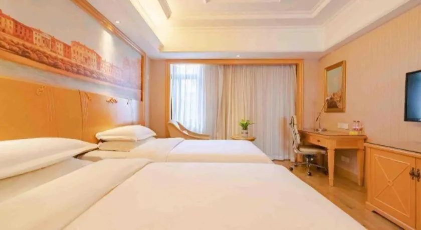 Bed in Vienna International Hotel Lhasa Potala Palace