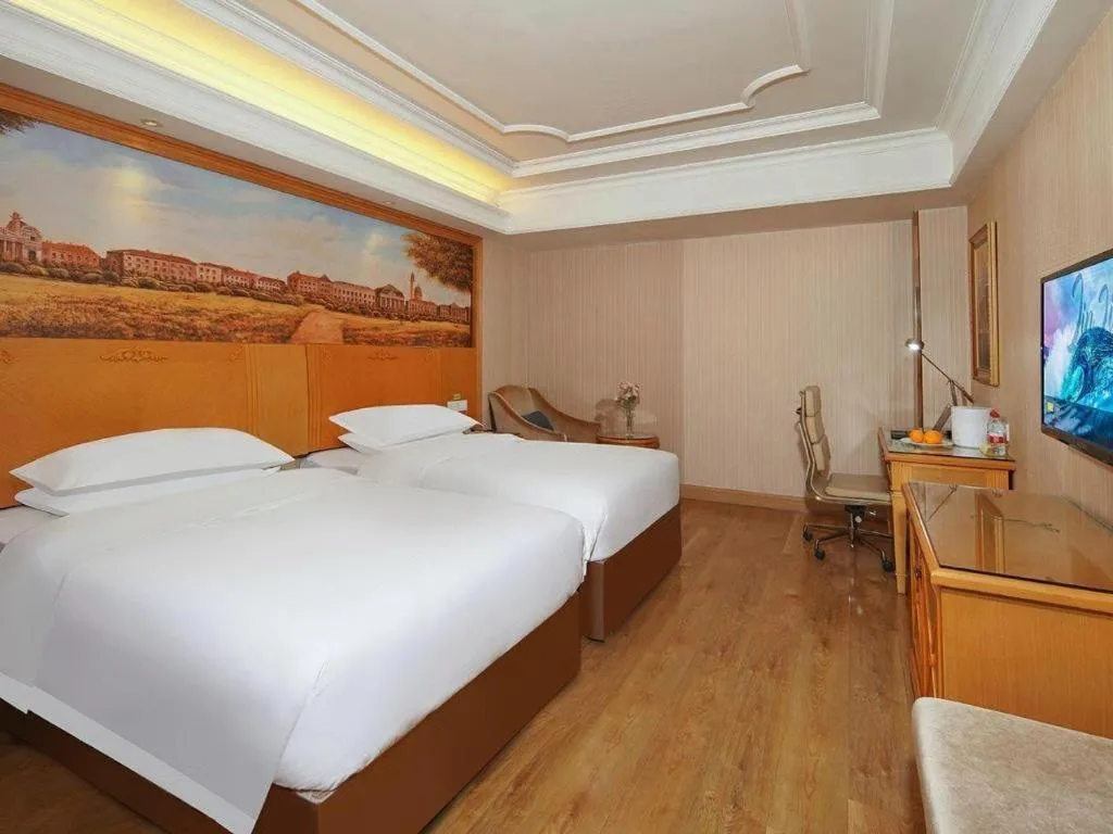 Bed in Vienna International Hotel Lhasa Potala Palace