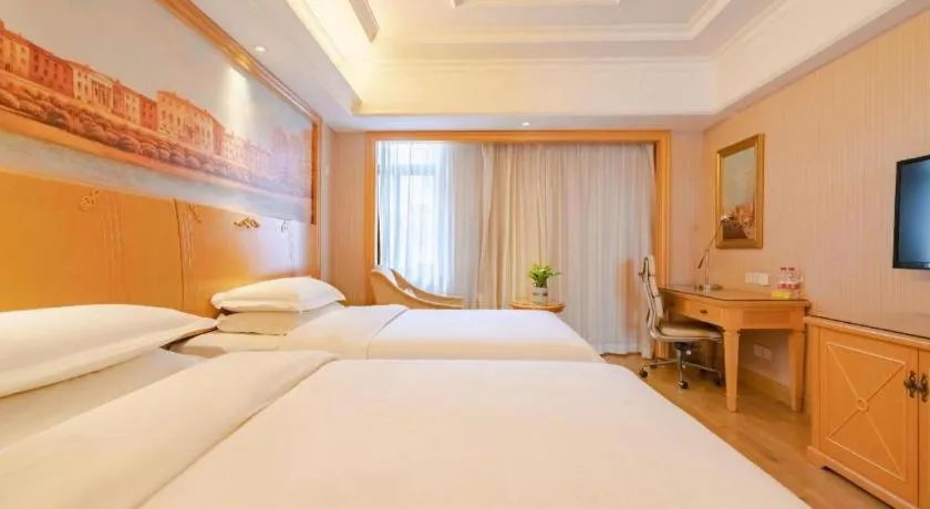 Bed in Vienna International Hotel Lhasa Potala Palace