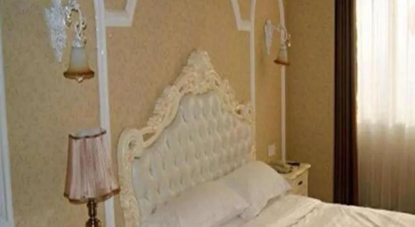 Bed in Vienna Hotel Qingdao Jiaozhou Branch