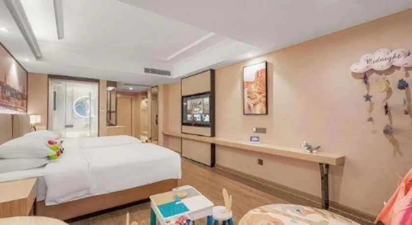 Bed in Vienna International Hotel Guangzhou Baiyun Dayuanli Plaza