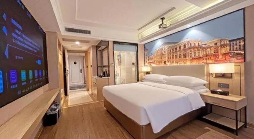 Bed in Vienna International Hotel Guangzhou Baiyun Dayuanli Plaza