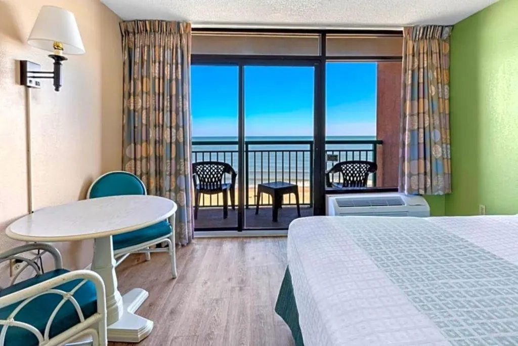 Bed in Sand Castle Resort by Patton Hospitality