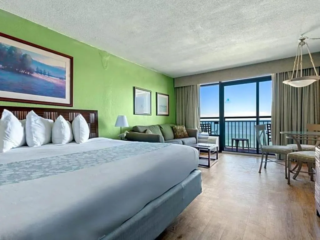 Bed in Sand Castle Resort by Patton Hospitality