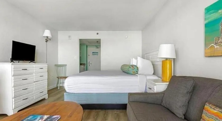 Bed in Sand Castle Resort by Patton Hospitality