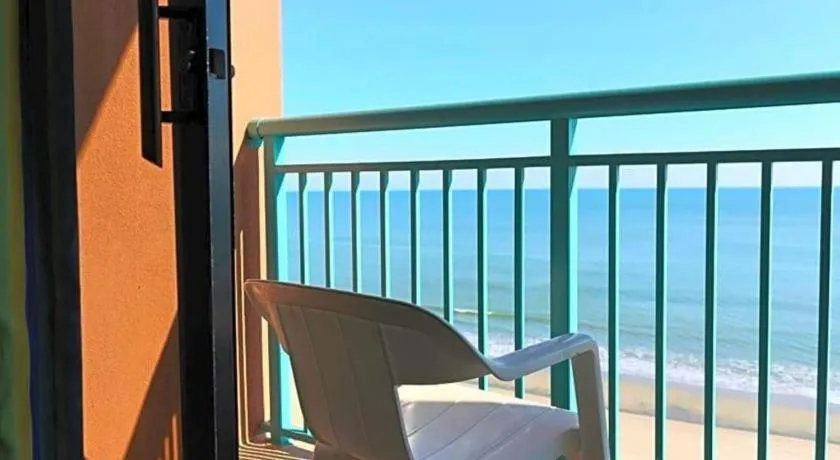 Bed in Sand Castle Resort by Patton Hospitality