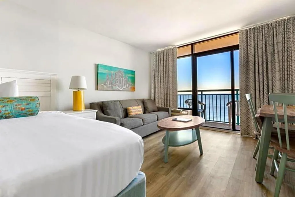 Bed in Sand Castle Resort by Patton Hospitality