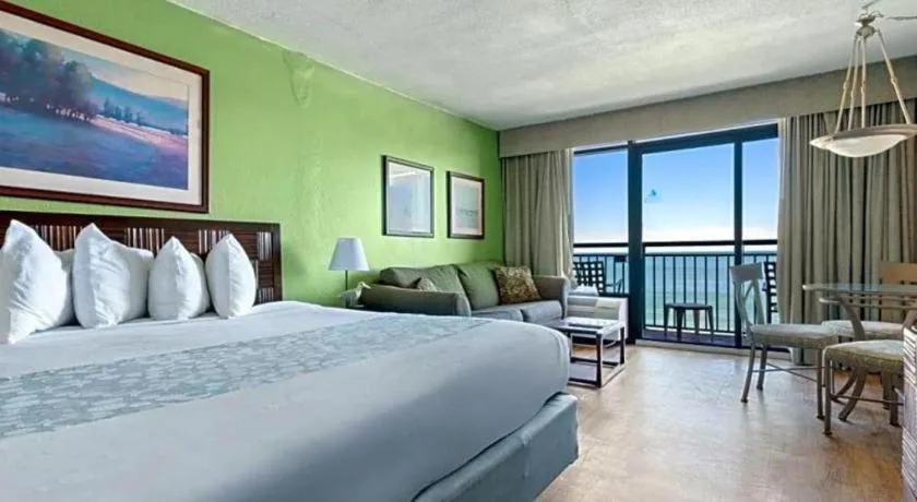 Bed in Sand Castle Resort by Patton Hospitality