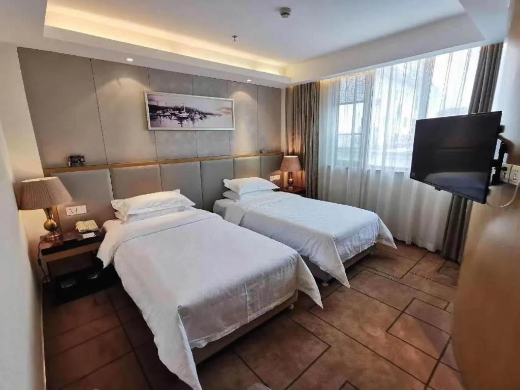 Bed in Jinjiang Metropolo Shanghai Minhang