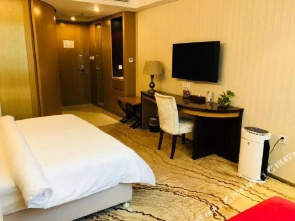 Bed in Jinjiang Metropolo Shanghai Minhang