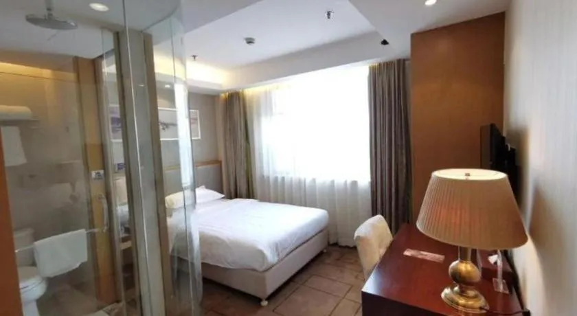 Bed in Jinjiang Metropolo Shanghai Minhang