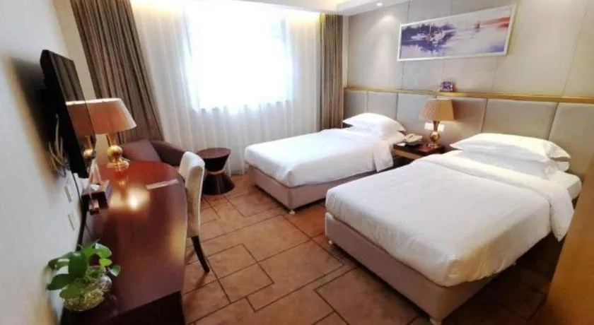 Bed in Jinjiang Metropolo Shanghai Minhang