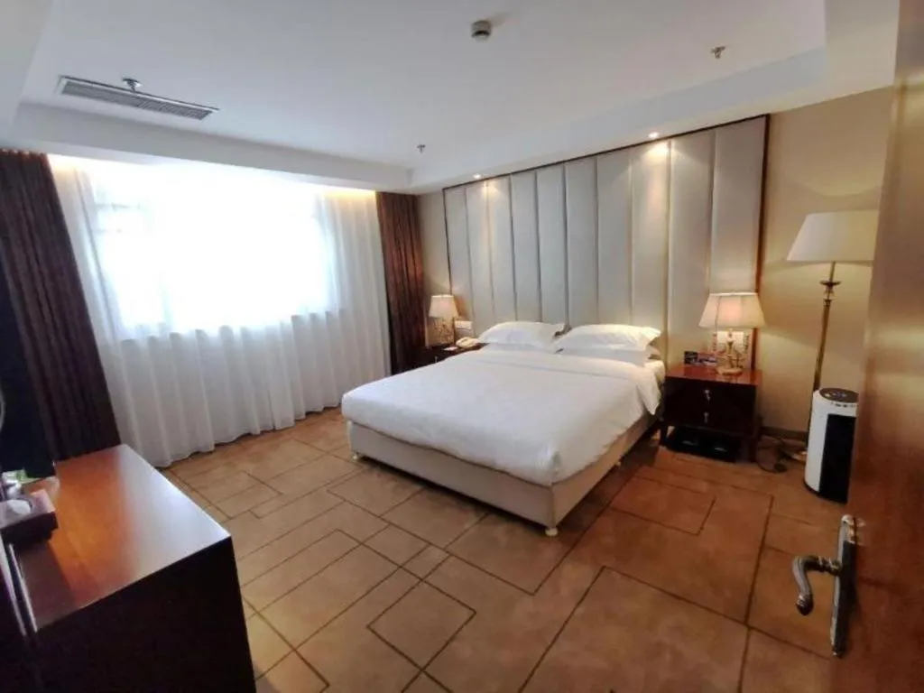 Bed in Jinjiang Metropolo Shanghai Minhang