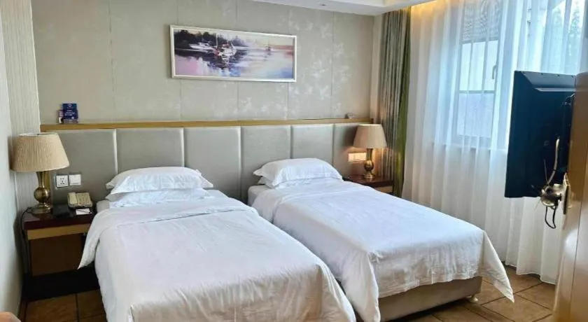 Bed in Jinjiang Metropolo Shanghai Minhang