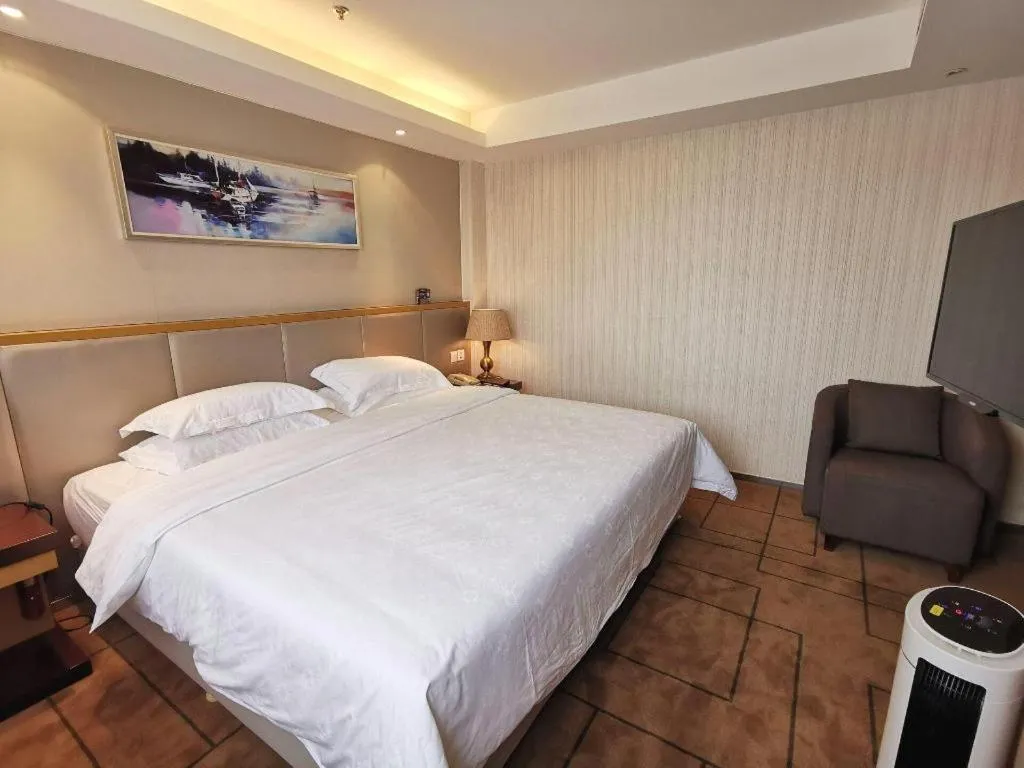 Bed in Jinjiang Metropolo Shanghai Minhang