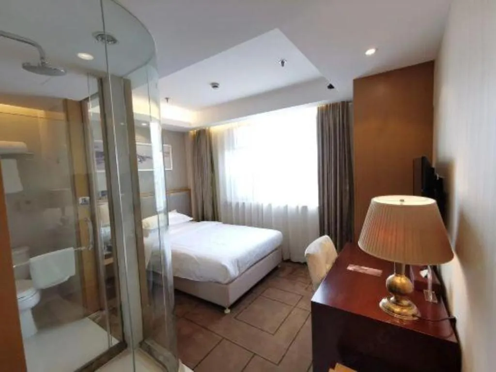 Bed in Jinjiang Metropolo Shanghai Minhang