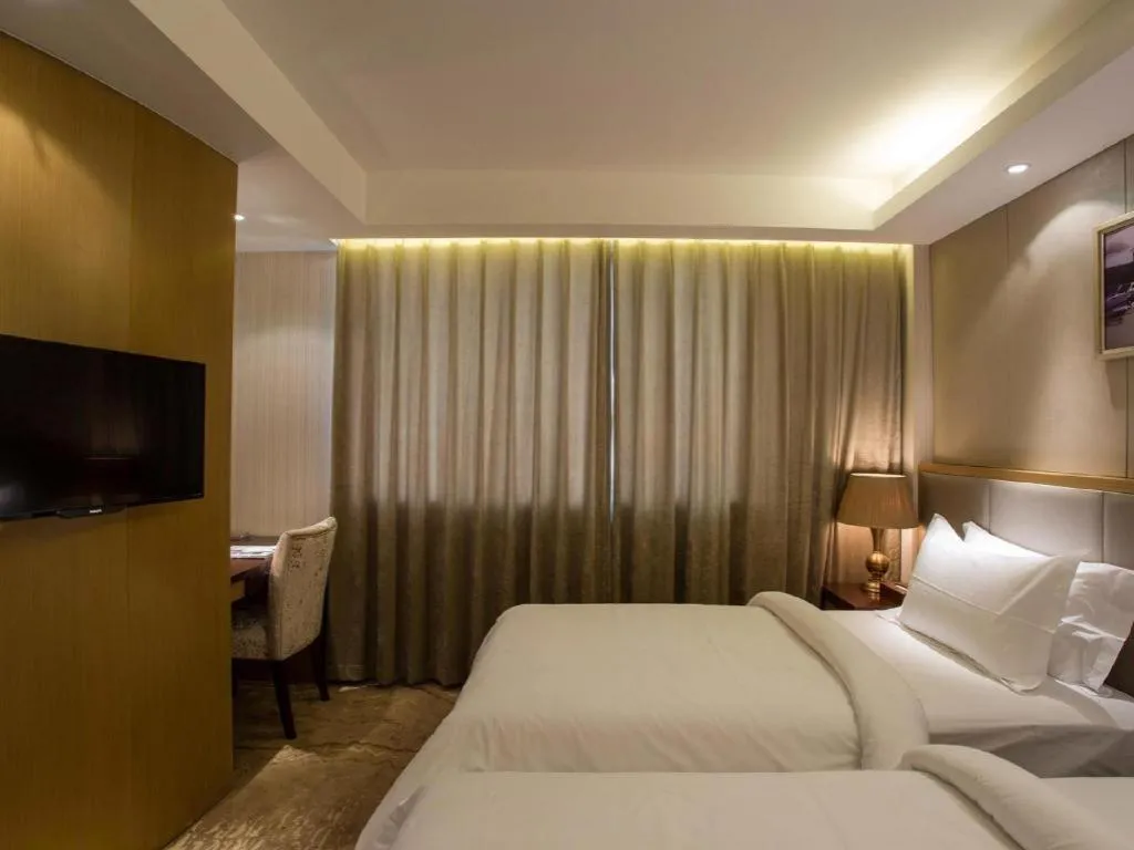 Bed in Jinjiang Metropolo Shanghai Minhang