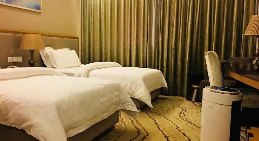 Bed in Jinjiang Metropolo Shanghai Minhang