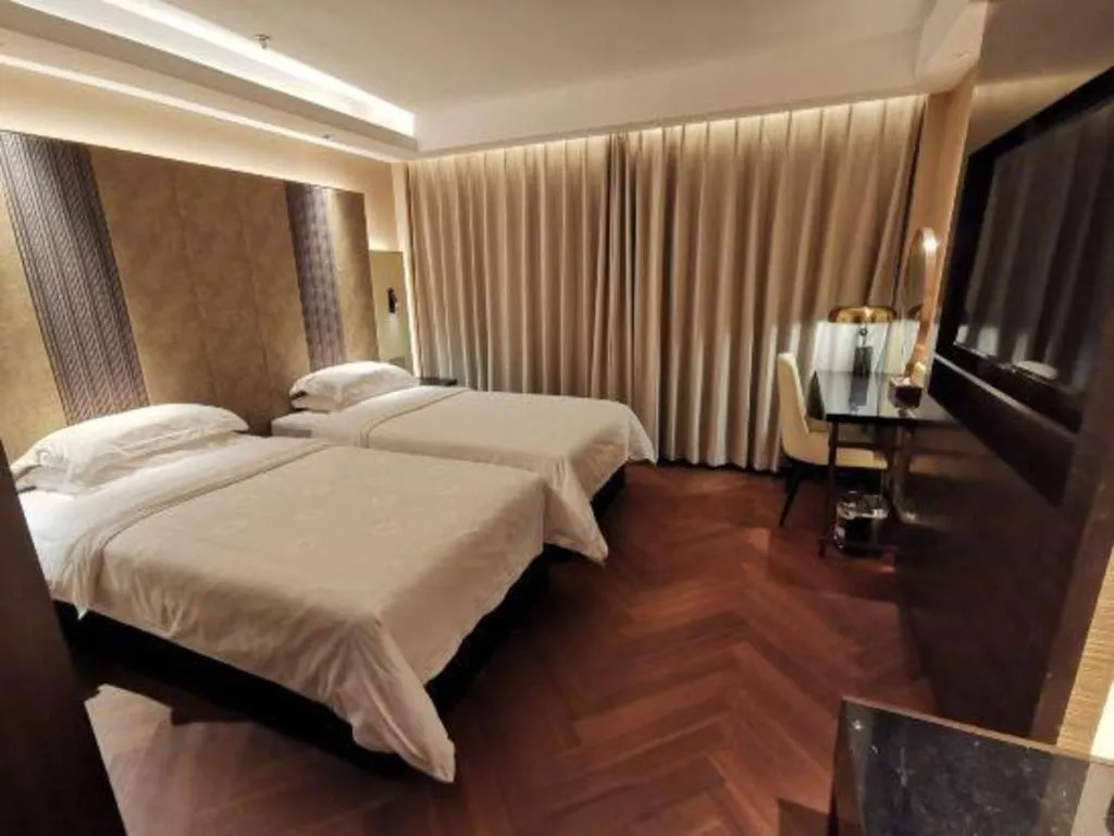 Bed in Jinjiang Metropolo Shanghai Minhang