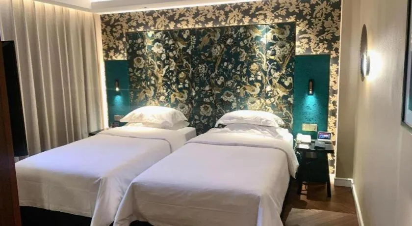 Bed in Jinjiang Metropolo Shanghai Minhang