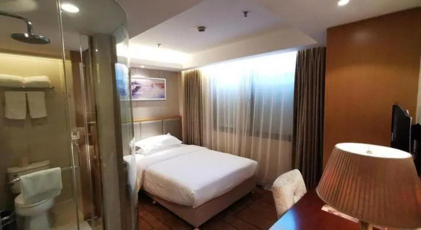 Bed in Jinjiang Metropolo Shanghai Minhang