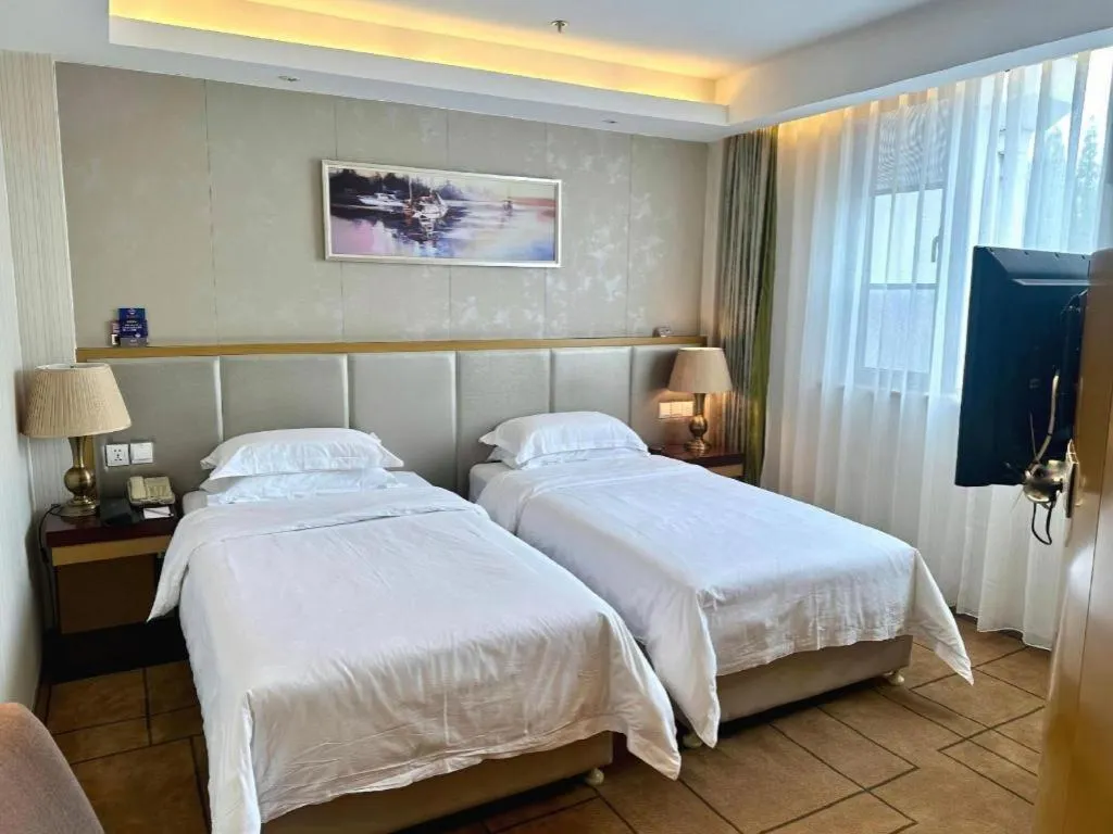 Bed in Jinjiang Metropolo Shanghai Minhang